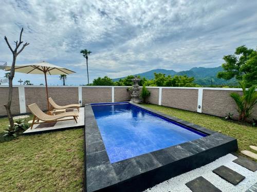 Hồ bơi trong/gần Stunning 2 Bedroom Villa with Pool & Rooftop in Amed - The Myria Villa
