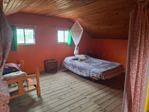 Giường trong phòng chung tại Doña polilla