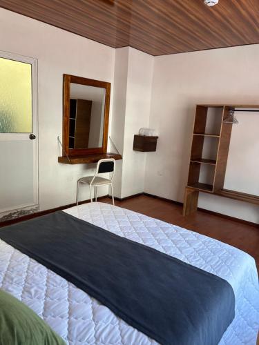 Postel nebo postele na pokoji v ubytování Casa Descanso y Madera