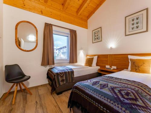 Giường trong phòng chung tại Salzach Lodge
