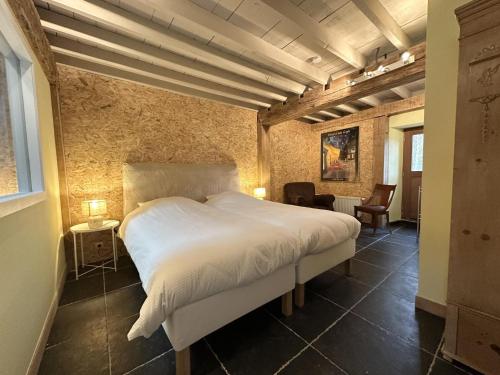 Giường trong phòng chung tại Ry de Belle Rose