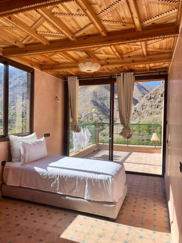 Giường trong phòng chung tại La Perle de Neige