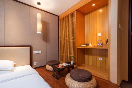 Postel nebo postele na pokoji v ubytování Guilaiqi Boutique Hotel (Chengdu Chunxi Road Xinnanmen Subway Station Branch)