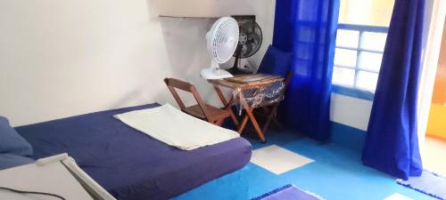 En eller flere senge i et værelse på SUITES E CHALES PRIVADOS Rock's&Rose's home