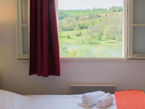 Postel nebo postele na pokoji v ubytování Maison cosy avec terrasse au Carla-Bayle - API-1-52-1369