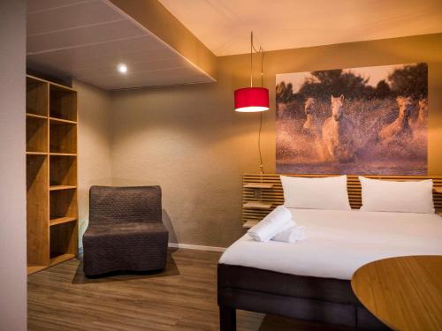 Giường trong phòng chung tại ibis Arles