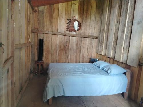 En eller flere senge i et værelse på Somos Zapatón Catarata EL REY