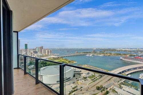 a balcony with a view of the water at Miami Lux 1BR 37th Floor Bay City Views in Miami