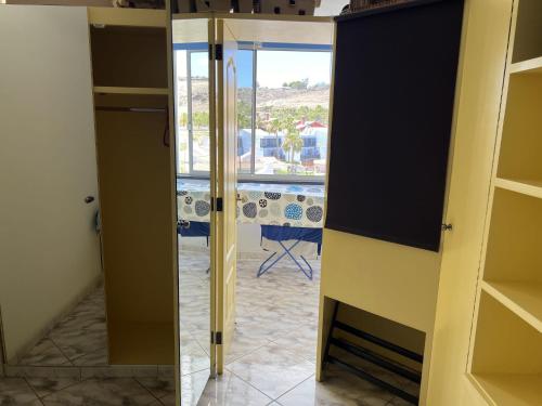 a door to a room with a view of a room at El Alba in San Bartolomé de Tirajana