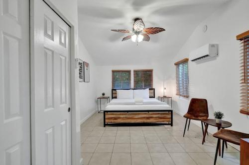 a bedroom with a bed with a butterfly on the ceiling at Tropical Oasis Studio w Pool in Fort Lauderdale