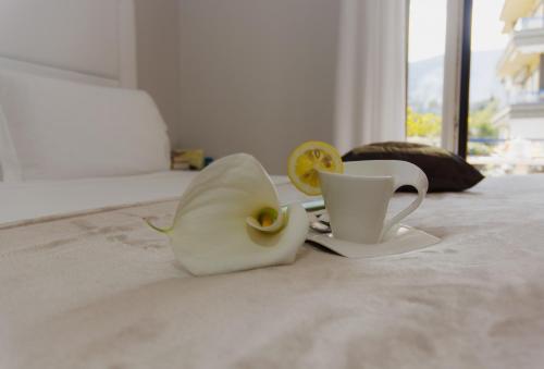 Postel nebo postele na pokoji v ubytování Bougainvillea Relais