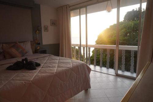 En eller flere senge i et værelse på Residy Hideaway