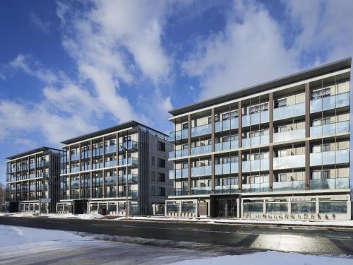 een weergave van een kantoorgebouw bij Minn Chitose in Chitose