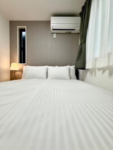 HOUSTAY NISSIJIN B Private House with Parking