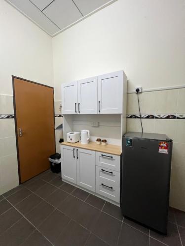 Nhà bếp/bếp nhỏ tại Mumtaz Beach Homestay 2