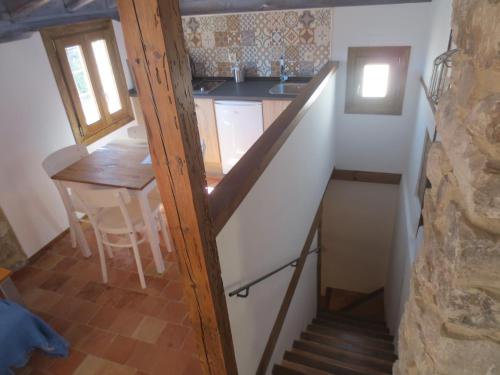 Una cocina o cocineta en Apartamentos Turísticos El Losal