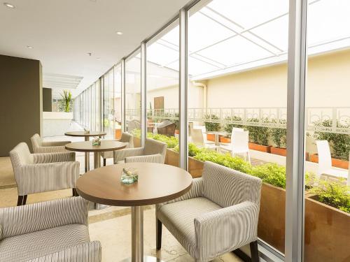Ein Sitzbereich in der Unterkunft Hotel bh Bicentenario