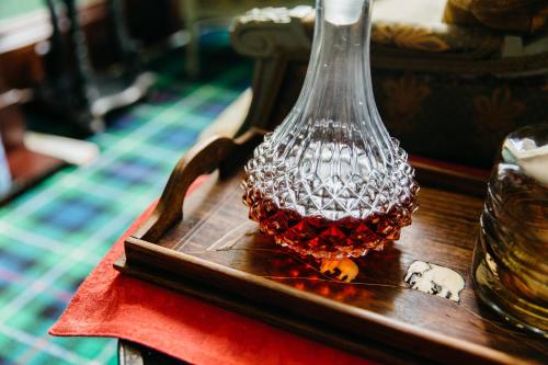a glass vase sitting on top of a table at Altavona House in Oban