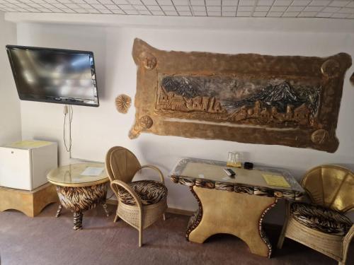 Et tv og/eller underholdning på Faraon apartmani Bg