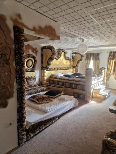 En eller flere senge i et værelse på Faraon apartmani Bg