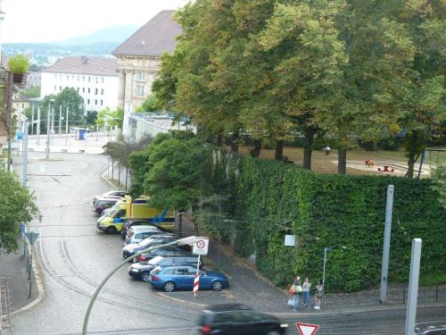 a row of cars parked in a parking lot at Vorderer Westen Kassel in Kassel