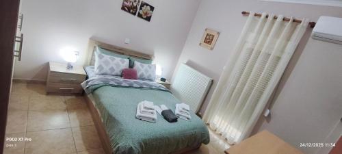 Giường trong phòng chung tại Δ2