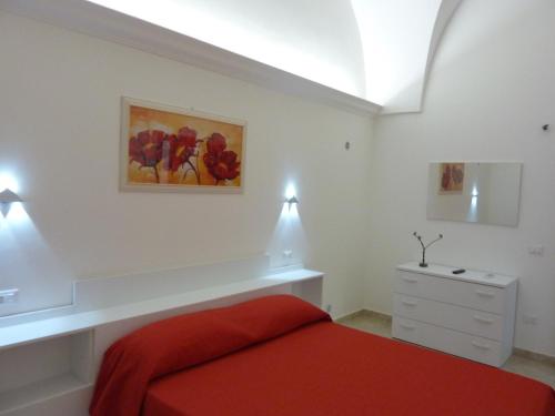 A bed or beds in a room at Casa Gianni