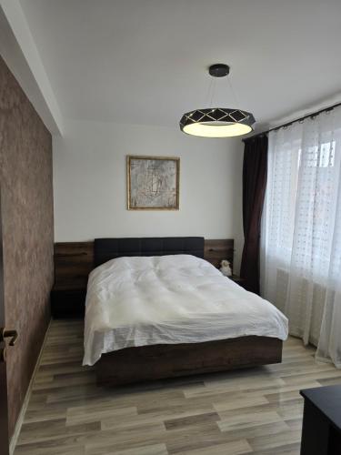 Un ou plusieurs lits dans un hébergement de l'établissement DOL House - Apartment