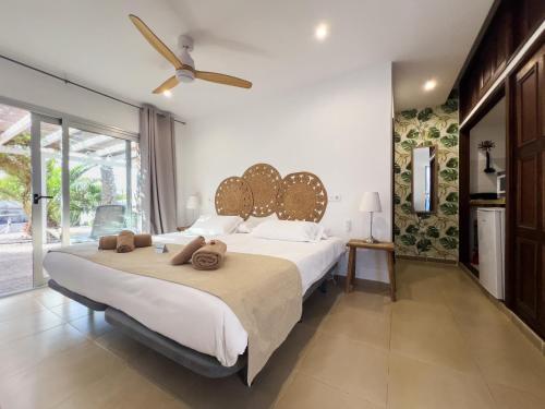 Postel nebo postele na pokoji v ubytování Hélène Holidays - Hotel Boutique