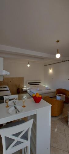 a kitchen with a white counter top in a room at Vaso & Viktor Apartment in Kotor