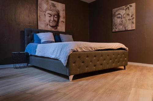 En eller flere senge i et værelse på At dream, logement privatif