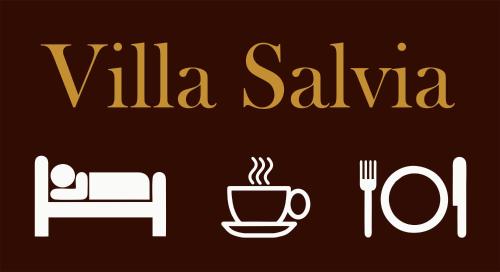 a sign with a cup of tea and a chair at Villa Salvia in Mostar