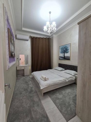 En eller flere senge i et værelse på Toshkent siti