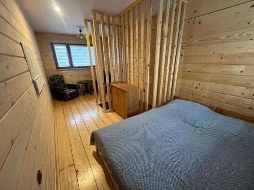 En eller flere senge i et værelse på "Dom Pod Grzybkiem"