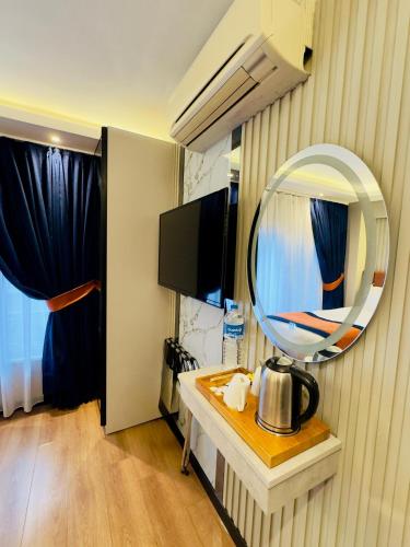 Et tv og/eller underholdning på Regency World Hotel