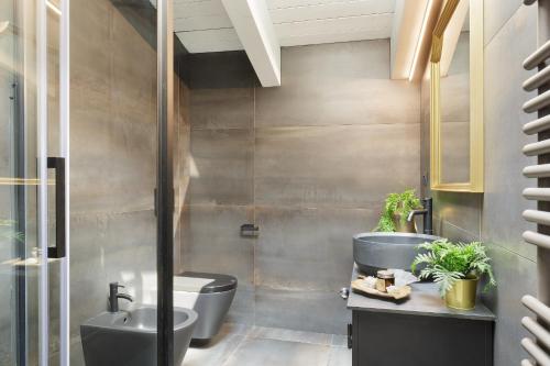 Et badeværelse på Tranquility Inn- 25 min Duomo M1