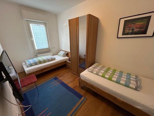 Giường trong phòng chung tại Top Apartment Rödermark 2SZ