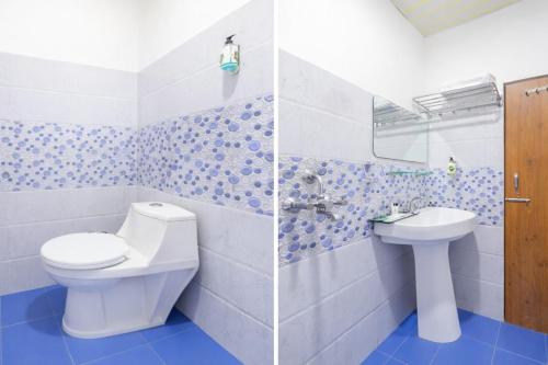 Et badeværelse på Hotel Sawera Heritage Comfort Residency- Free Parking & Restaurant and Lift Facilities - Fully #Air Conditioning - A Top Rated Hotel!