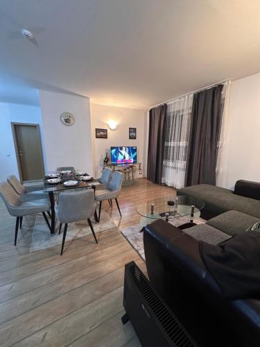 Et opholdsområde på Alenik Private Apartment The Stream Resort Hotel