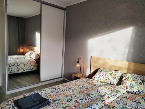 En eller flere senge i et værelse på Row House near LUT and LAB Campus - Sauna - 24 Self Check-in