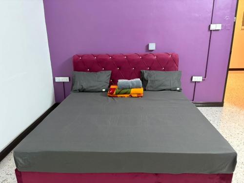 En eller flere senge i et værelse på 786 Bali Top Homestay