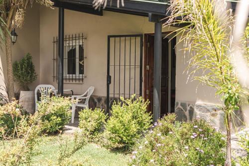 Een tuin van Casa Ganesha Chapadmalal