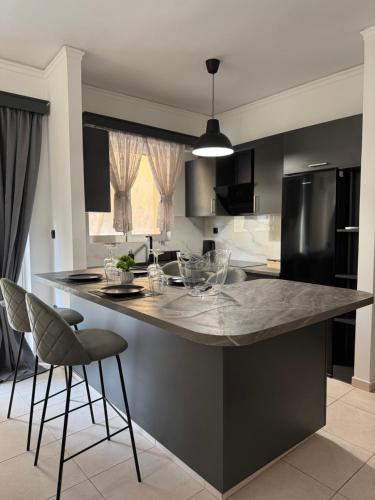 Køkken eller tekøkken på Cleo Luxury Suites