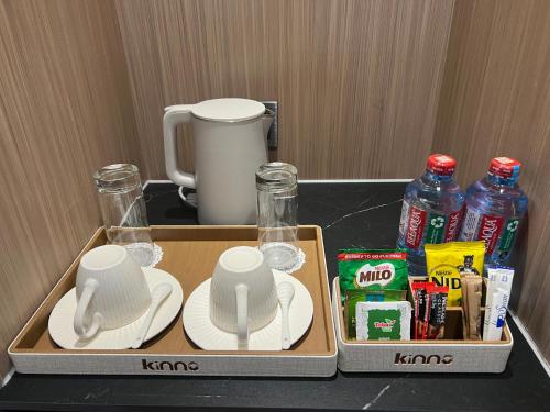 Příslušenství pro přípravu čaje a kávy v ubytování Kinno International Hotel