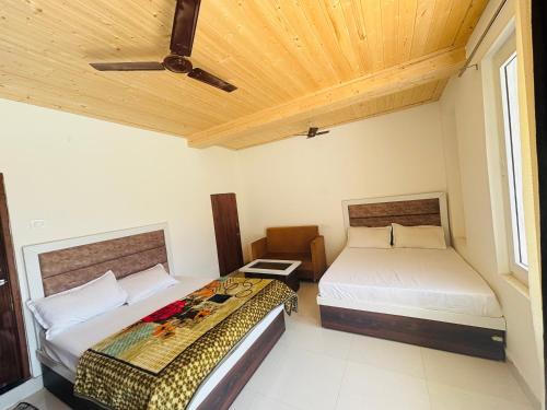 Een bed of bedden in een kamer bij The highlight stay