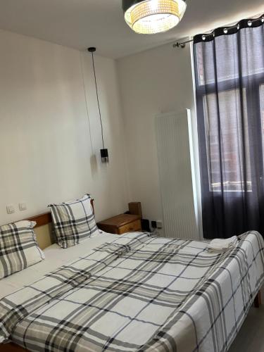 Postel nebo postele na pokoji v ubytování Suzanne house