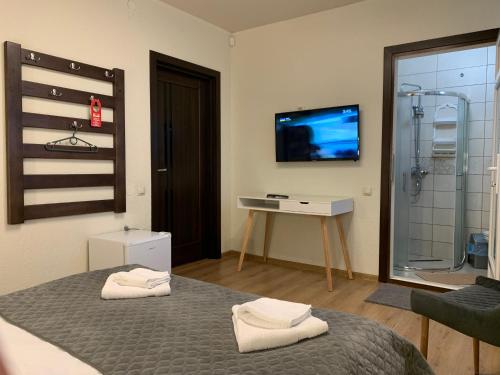 En eller flere senge i et værelse på SzaboFFcsik