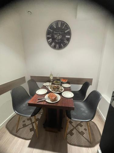 Et opholdsområde på Petite maison place du marché