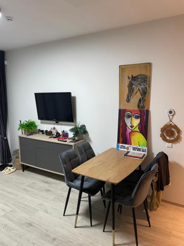 Et tv og/eller underholdning på Relax Mode Apartment