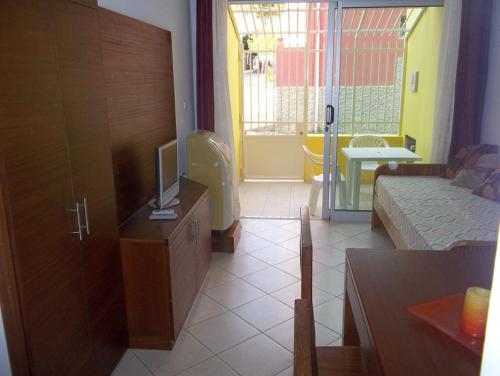 Ένα ή περισσότερα κρεβάτια σε δωμάτιο στο Basic Hotel